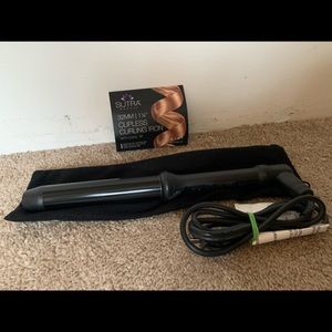 NWT- clipless curling iron